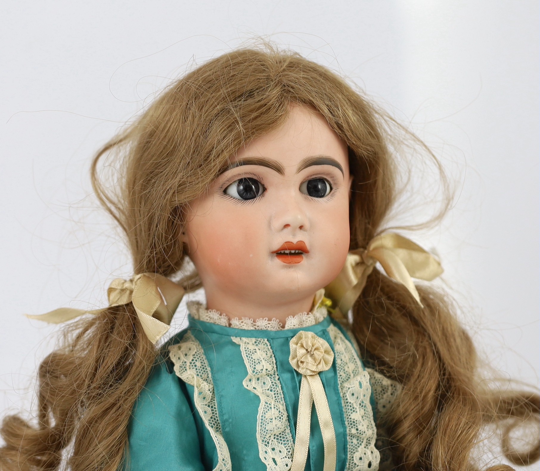 A Jumeau bisque doll, French, circa 1895, 20in.